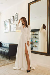 Elegant A-line silk dress with long sleeves and flowing full-length skirt for formal occasions