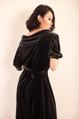 Velvet maxi dress with puff sleeves and soft drape for elegant evening or occasion wear