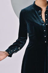 Fitted velvet midi dress with pearl button accents and mandarin collar neckline