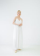 Robe longue en lin à bretelles spaghetti et silhouette fluide