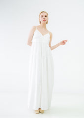 Robe longue en lin à bretelles spaghetti et silhouette fluide