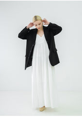 Robe longue en lin à bretelles spaghetti et silhouette fluide