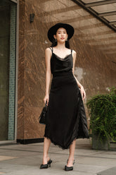 Silk camisole top with lace trim and draped neckline for elegant evening styling