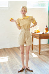 High-Waisted Linen Shorts with Tailored Button Detail
