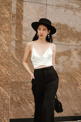 Silk camisole top with wrap front and open back detail for elegant occasion styling