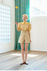 High-Waisted Linen Shorts with Tailored Button Detail