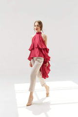 Tailored high-waisted silk pants with tapered leg and rolled cuffs for refined style