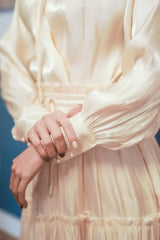 Silk midi skirt with soft pleats and elastic waist for a fluid, feminine silhouette