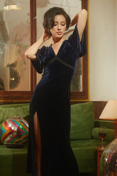 Velvet wrap midi dress with flared sleeves and thigh-high slit for evening elegance