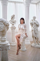 Silk blouse with ruched sleeves and round neckline for an elegant, softly tailored look