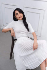 High-waisted pleated midi skirt in breathable lightweight silk fabric for effortless elegance