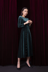 Velvet long-sleeve midi dress with pearl embellishments and soft flared silhouette