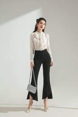 Silk blouse with cascading front ruffle and pearl collar button for timeless feminine elegance
