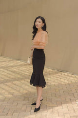 Ruffled organza blouse with pleated bodice, puff sleeves, and elastic waist detail