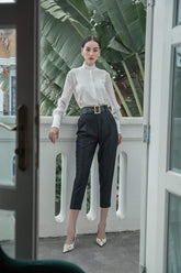 Sheer organza blouse with pleated bib front and high collar for elegant formal styling