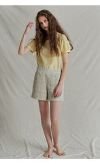 Haut bouffant en lin à manches courtes et encolure arrondie