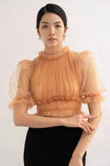 Silk flared midi skirt with front slit and pom-pom trim hem for elegant movement