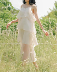 Layered organza dress with flowing tiers and delicate straps for ethereal summer elegance
