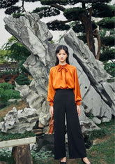 Silk Button-Neck Blouse with Bow Detail and Voluminous Sleeves