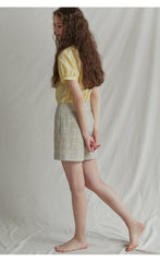 Haut bouffant en lin à manches courtes et encolure arrondie