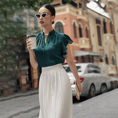 Silk pleated midi skirt with high-waisted fit for a flowy and elegant daytime silhouette