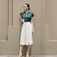 Silk pleated midi skirt with high-waisted fit for a flowy and elegant daytime silhouette