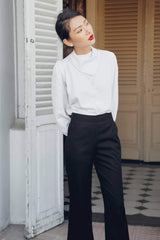 Silk blouse with structured collar and gathered sleeves for modern tailored elegance