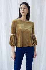 Soft velvet blouse with gathered puff sleeves and lace trim detailing for elevated styling