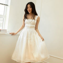 Sleeveless tiered midi dress in lightweight organza with ruched bust and flowy silhouette