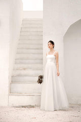 Sleeveless organza dress with soft tulle overlay and corset back detail for feminine elegance