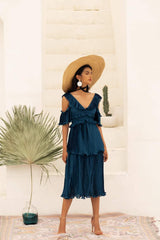 Pleated off-shoulder silk dress with ruffle trim and tiered midi-length silhouette
