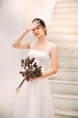 Sleeveless organza dress with soft tulle overlay and corset back detail for feminine elegance