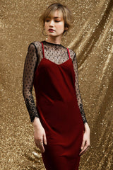 Velvet slip dress with lace mesh overlay and fitted silhouette for evening elegance