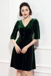Velvet A-line dress with V-neckline, fitted bodice, and half sleeves for timeless elegance