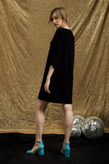 Elegant velvet A-line mini dress with half sleeves and contrast bow detail for evening occasions