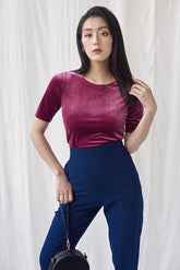 Short-sleeve fitted velvet blouse with classic crew neckline and soft-stretch comfort