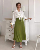 Silk blouse with classic collar and tie-front detail for a refined contemporary silhouette