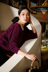 Textured velvet blouse with relaxed fit and three-quarter sleeves for elegant styling