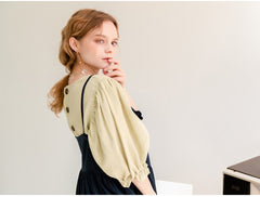 Robe longue en lin à ourlet volanté et boutonnée sur le devant