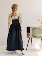 Robe longue en lin à ourlet volanté et boutonnée sur le devant