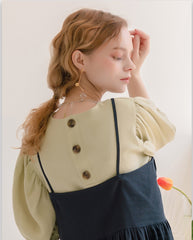 Robe longue en lin à ourlet volanté et boutonnée sur le devant