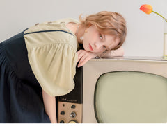 Robe longue en lin à ourlet volanté et boutonnée sur le devant