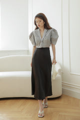 Tailored silk blouse with puffed sleeves and notched collar for elegant structured styling