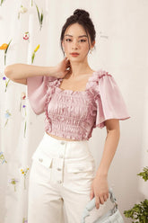 Silk blouse with ruched bodice, ruffle trim and flutter sleeves for romantic feminine styling