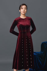Velvet long-sleeve midi dress with pearl button detailing and tailored waist silhouette