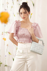 Silk blouse with ruched bodice, ruffle trim and flutter sleeves for romantic feminine styling