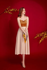 Velvet camisole top with draped cowl neckline and slim shoulder straps for elegant layering