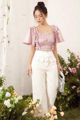 Silk blouse with ruched bodice, ruffle trim and flutter sleeves for romantic feminine styling