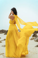 Robe longue sans manches en mousseline de soie et organza avec taille froncée et ourlet fluide à volants