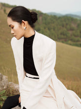 Textured wool long coat with tailored silhouette and open front design